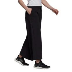 Adidas Sportswear Wide Pants 12 Adidas Sportswear Wide Pants -Venum Shop GU9679 APP on model walking white